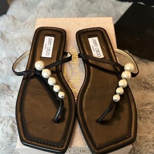 Jimmy Choo Black Leather Thong Sandals with Pearl Accents